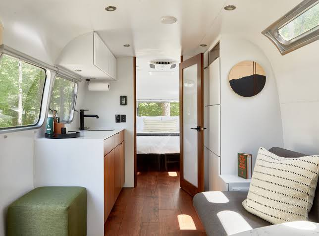 The interior of a renovated Airstream at Cape Cod Auto Camp
