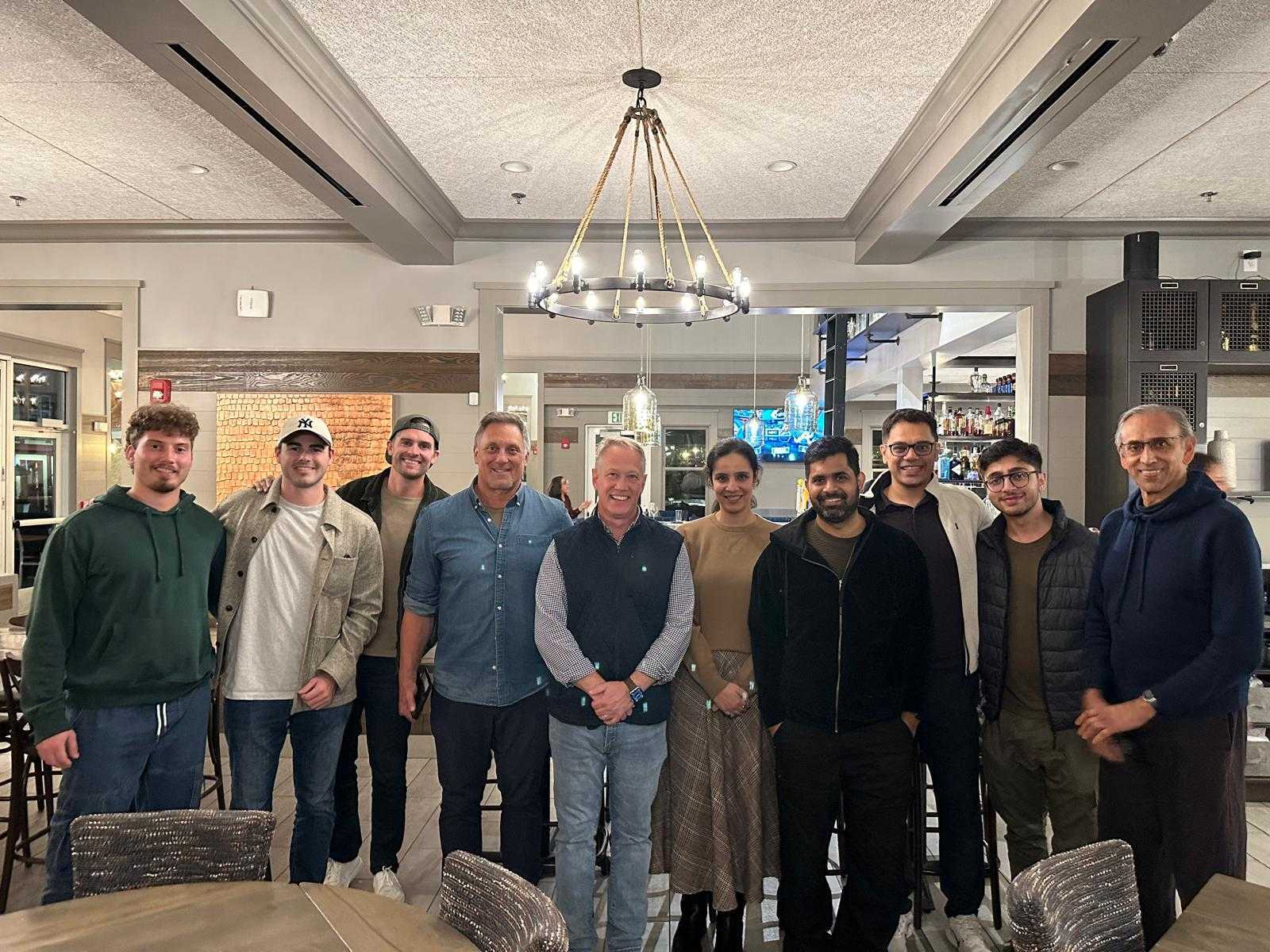 The team gathered together for dinner during the offsite